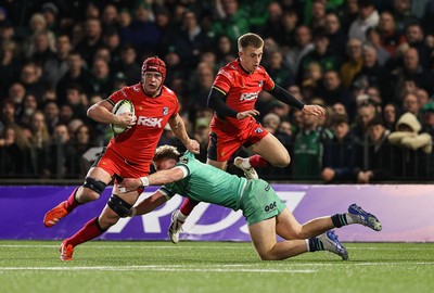 050425 - Connacht v Cardiff Rugby - EPCR Challenge Cup Round of 16 - James Botham of Cardiff Rugby is tackled by Hugh Gavin of Connacht