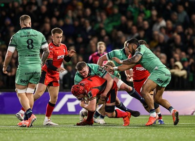 050425 - Connacht v Cardiff Rugby - EPCR Challenge Cup Round of 16 - James Botham of Cardiff Rugby is tackled by Oisín Dowling of Connacht