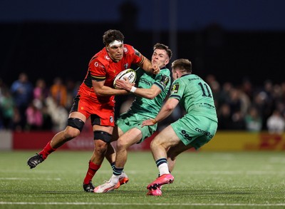 050425 - Connacht v Cardiff Rugby - EPCR Challenge Cup Round of 16 - Teddy Williams of Cardiff Rugby in action against Matthew Devine, centre, and Finn Treacy of Connacht