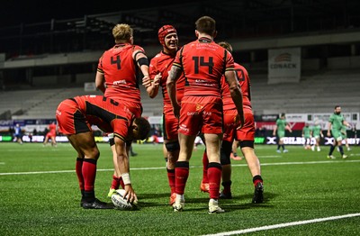 050425 - Connacht v Cardiff Rugby - EPCR Challenge Cup Round of 16 - Josh Adams of Cardiff Rugby, 14, celebrates with team-mats after scoring a second half try