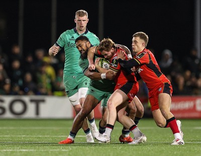 050425 - Connacht v Cardiff Rugby - EPCR Challenge Cup Round of 16 - Rory Jennings of Cardiff Rugby is tackled by Bundee Aki of Connacht
