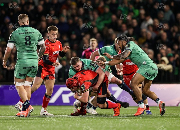 050425 - Connacht v Cardiff Rugby - EPCR Challenge Cup Round of 16 - James Botham of Cardiff Rugby is tackled by Oisín Dowling of Connacht