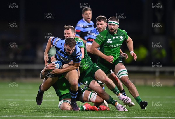 150423 - Connacht v Cardiff Rugby - United Rugby Championship - Max Llewellyn of Cardiff is tackled by Jack Carty of Connacht