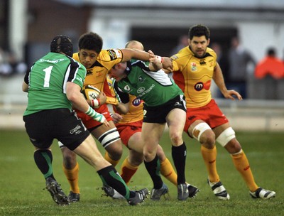 17.03.10 Connacht v Dragons... Dragon's Toby Faletau is confronted by Connacht's Brett Wilkinson 