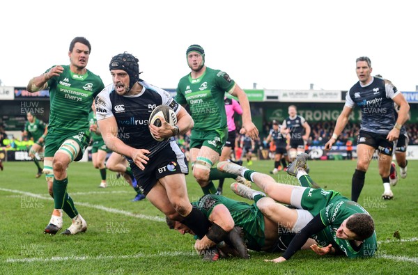 020319 - Connacht v Ospreys - Guinness PRO14 -  Dan Evans of Ospreys is tackled by Tom Farrell, left, and Stephen Fitzgerald of Connacht