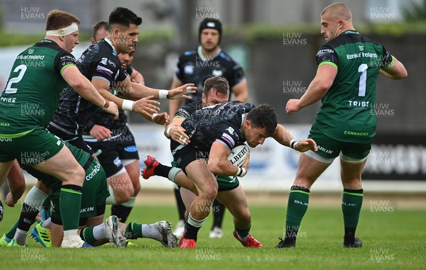 040621 - Connacht v Ospreys - Guinness PRO14 Rainbow Cup - Luke Morgan of Ospreys is tackled by Jack Carty of Connacht