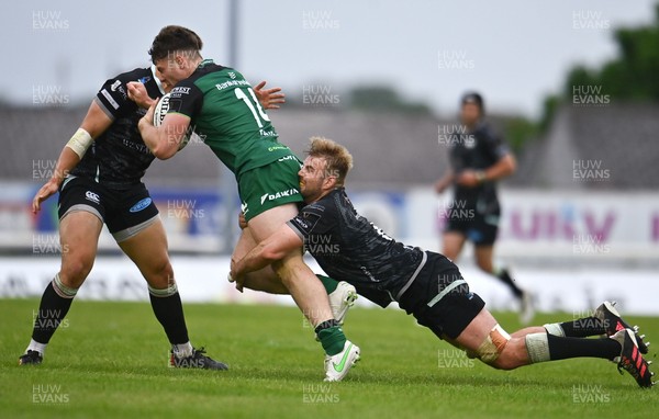040621 - Connacht v Ospreys - Guinness PRO14 Rainbow Cup - Peter Sullivan of Connacht is tackled by Will Griffiths of Ospreys