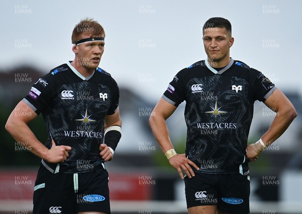 040621 - Connacht v Ospreys - Guinness PRO14 Rainbow Cup - Ospreys players Sam Cross, left, and Max Nagy dejected after the match