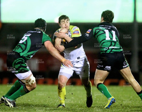 150213 Connacht v Ospreys - RaboDirect Pro12 - Ospreys' Sam Lewis is tackled by Connacht's Mick Kearney and Danie Poolman 