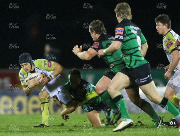 150213 Connacht v Ospreys - RaboDirect Pro12 - Ospreys' Matthew Morgan is tackled by Connacht's Dan Parks 