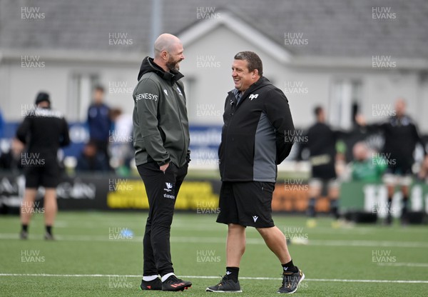 211023 - Connacht v Ospreys - United Rugby Championship - Connacht head coach Peter Wilkins, left, and Ospreys head coach Toby Booth in conversation before the match