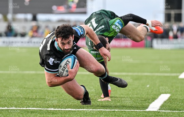 211023 - Connacht v Ospreys - United Rugby Championship - Dom Morris of Ospreys is tackled by Andrew Smith of Connacht