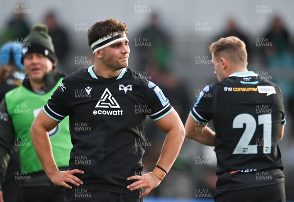 211023 - Connacht v Ospreys - United Rugby Championship - Lewis Lloyd of Ospreys, left, and team-mate Luke Davies after their side's defeat
