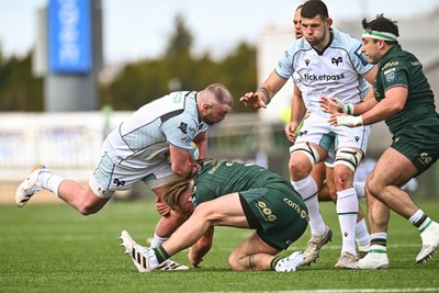 280326 - Connacht Rugby v Ospreys, United Rugby Championship - Sam Parry of Ospreys takes on Finlay Bealham of Connacht