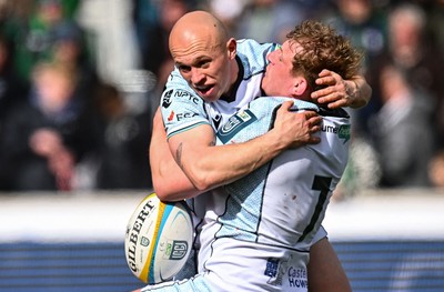 280326 - Connacht Rugby v Ospreys, United Rugby Championship - Jac Morgan of Ospreys, 7, celebrates Luke Davies after crossing the try line, but the try was ruled out