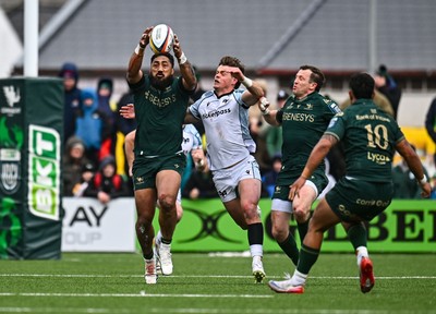280326 - Connacht Rugby v Ospreys, United Rugby Championship - Bundee Aki of Connacht wins the ball from Jack Walsh of Ospreys