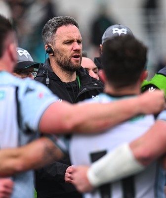 280326 - Connacht Rugby v Ospreys, United Rugby Championship - Ospreys head coach Mark Jones speaks to the players at the end of the match