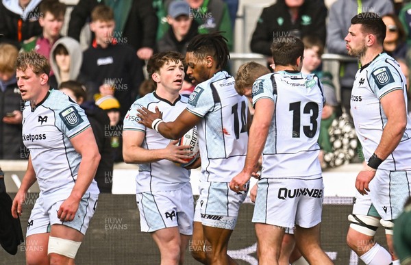 280326 - Connacht Rugby v Ospreys, United Rugby Championship - Ospreys players celebrate as Dan Kasende scores their first try