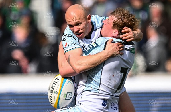 280326 - Connacht Rugby v Ospreys, United Rugby Championship - Jac Morgan of Ospreys, 7, celebrates Luke Davies after crossing the try line, but the try was ruled out