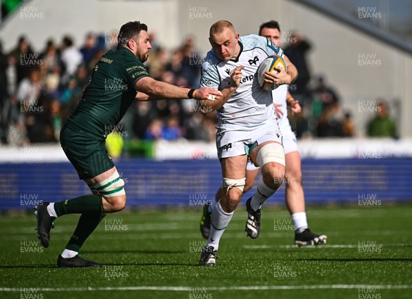 280326 - Connacht Rugby v Ospreys, United Rugby Championship - Huw Sutton of Ospreys takes on Josh Murphy of Connacht 