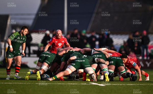 020324 - Connacht v Scarlets - United Rugby Championship - Efan Jones of Scarlets and Caolin Blade of Connacht look on during a scrum