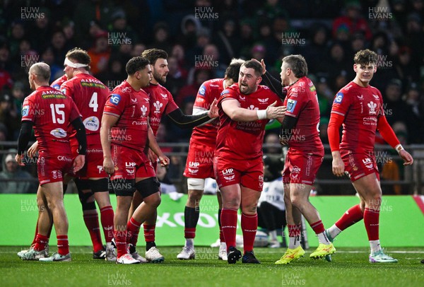 020324 - Connacht v Scarlets - United Rugby Championship - Wyn Jones of Scarlets, centre, is congratulated by teammates after winning a penalty