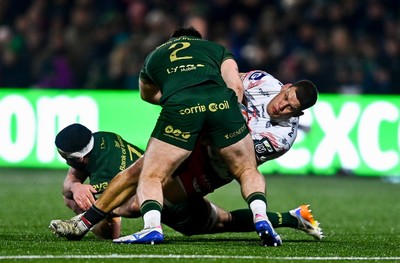 130326 - Connacht v Scarlets - United Rugby Championship - Jarrod Taylor of Scarlets is tackled by Dylan Tierney-Martin, 2, and Paul Boyle of Connacht