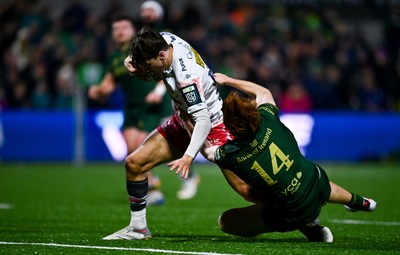 130326 - Connacht v Scarlets - United Rugby Championship - Ioan Jones of Scarlets dives over to score his side's second try despite the tackle of Shane Jennings of Connacht