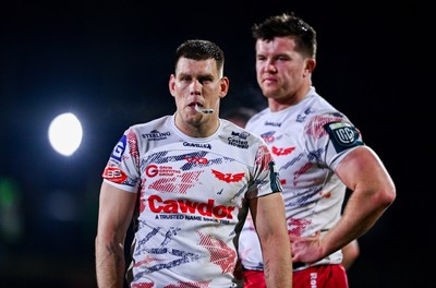 130326 - Connacht v Scarlets - United Rugby Championship - Jarrod Taylor, left, and Jac Price of Scarlets after the match