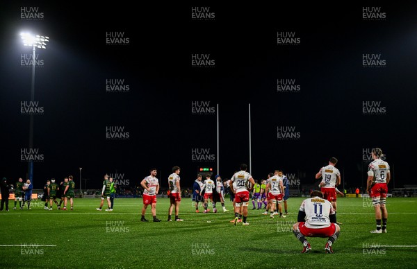 130326 - Connacht v Scarlets - United Rugby Championship - Macs Page of Scarlets, 11, and team-mates after the match