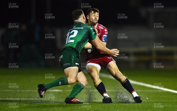 211022 - Connacht v Scarlets - BKT United Rugby Championship - Ryan Conbeer of Scarlets is tackled by David Hawkshaw of Connacht