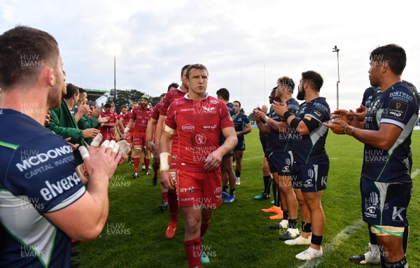 220918 - Connacht v Scarlets - Guinness PRO14 -  Hadleigh Parkes of Scarlets leads his side off the field 