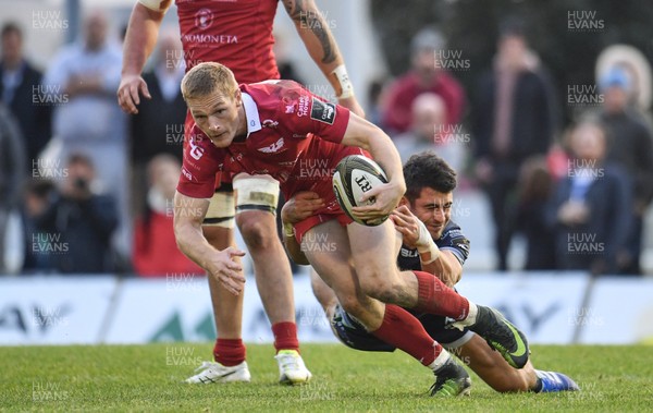 220918 - Connacht v Scarlets - Guinness PRO14 -  Johnny McNicholl of Scarlets is tackled by Tiernan O'Halloran of Connacht