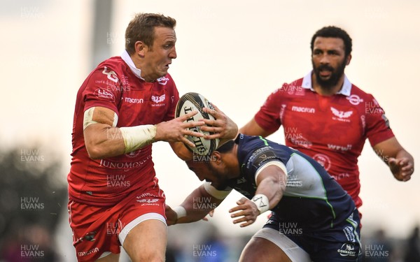 220918 - Connacht v Scarlets - Guinness PRO14 -  Hadleigh Parkes of Scarlets is tackled by Bundee Aki of Connacht 