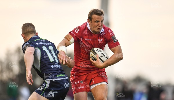 220918 - Connacht v Scarlets - Guinness PRO14 -  Hadleigh Parkes of Scarlets in action against Matt Healy of Connacht 