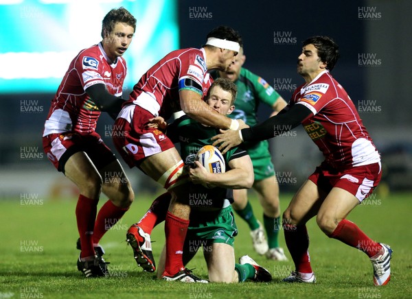 231113 Connacht v Scarlets…Connacht's Matt Healy tackled by Sione Timani and Gareth Owen of Scarlets(c) Huw Evans, Cardiff