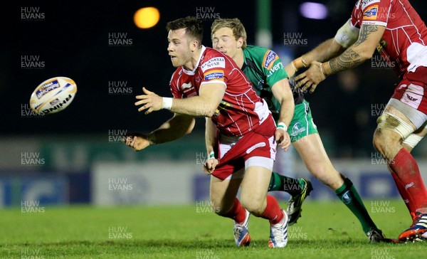 231113 Connacht v Scarlets…Scarlets's Gareth Davies and Kieran Marmion of Connacht(c) Huw Evans, Cardiff