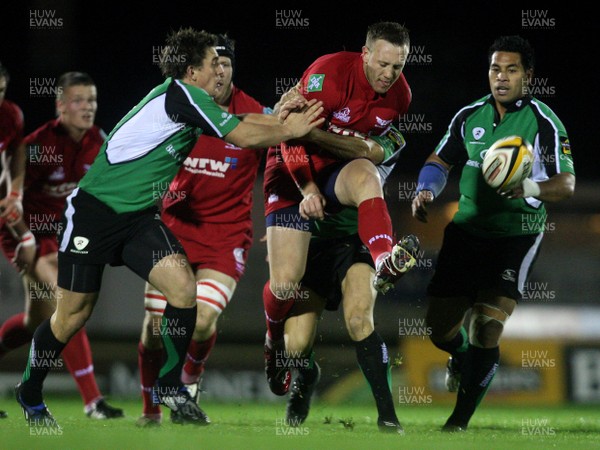 30.10.09 Connacht v Scarlets... Scarlets Morgan Stoddart tackled by Ian Keatley of Connacht. 