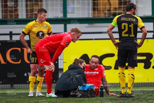 070721 - Connah's Quay Nomads v FC Alashkert - UEFA Champions League First Qualifying Round First Leg - Danny Holmes (15) of Connah’s Quay Nomads receives treatment