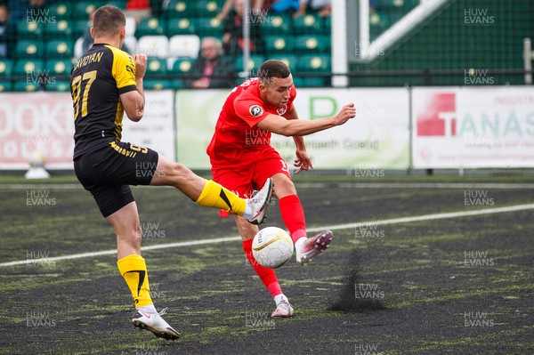 070721 - Connah's Quay Nomads v FC Alashkert - UEFA Champions League First Qualifying Round First Leg - Kris Owens (17) of Connah’s Quay Nomads clears despite the pressure of David Davidyan (97) of FC Alashkert