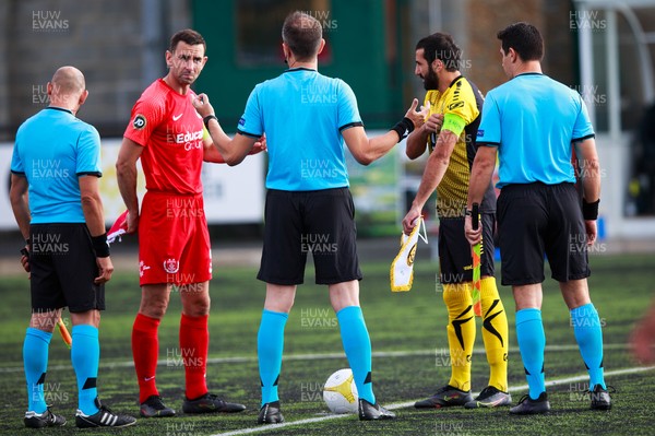 070721 - Connah's Quay Nomads v FC Alashkert - UEFA Champions League First Qualifying Round First Leg - Referee Vasílis Dimitríou talks to the two captains, George Horan (5) of Connah’s Quay Nomads and Artak Grigoryan (21) of FC Alashkert before kick off