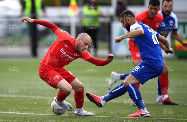 290721 - Connahs Quay Nomads v Prishtina - UEFA Europa Conference League, Qualifying Second Round - Jamie Insall of Connahs Quay Nomads is tackled by Leotrim Bekteshi