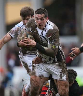 060414 - Cornish Pirates v Pontypridd, British and Irish Cup Quarter Final - Pontypridd's Dafydd Lockyer looks for support as Pirates' Ben Prescott tackles