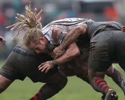 060414 - Cornish Pirates v Pontypridd, British and Irish Cup Quarter Final - Pontypridd's Wayne O'Connor is tackled by Pirates' Jack Andrew and Pirates' Ben Prescott