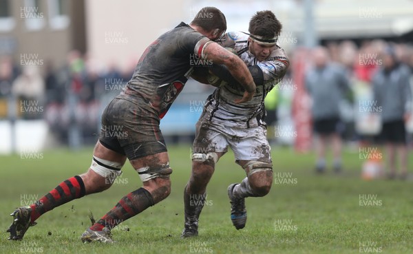 060414 - Cornish Pirates v Pontypridd, British and Irish Cup Quarter Final - Pontypridd's Owen Jenkins is tackled by Pirates' Darren Barry
