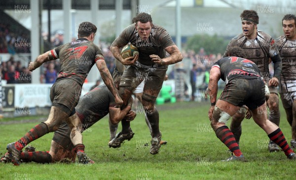 060414 - Cornish Pirates v Pontypridd, British and Irish Cup Quarter Final - Pontypridd's Dan Godfrey is tackled