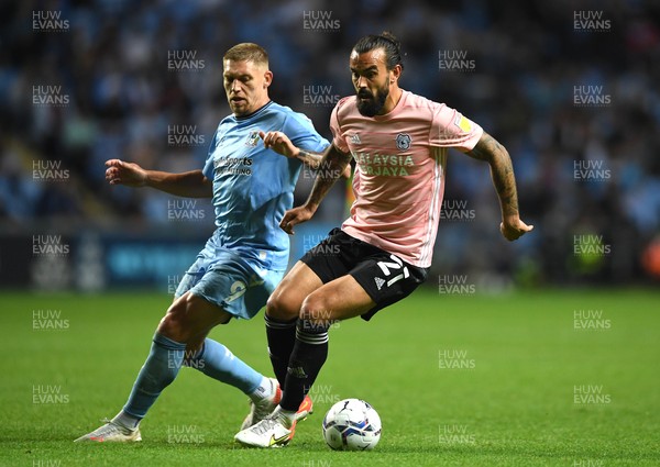 150921 - Coventry City v Cardiff City - EFL SkyBet Championship - Marlon Pack of Cardiff City is challenged by Martyn Waghorn of Coventry City