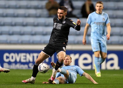 021121 - Coventry City v Swansea City - SkyBet Championship - Matt Grimes of Swansea City is tackled by Jamie Allen of Coventry City