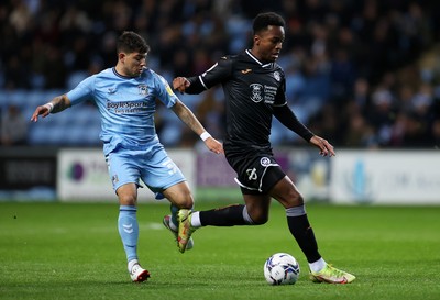 021121 - Coventry City v Swansea City - SkyBet Championship - Ethan Laird of Swansea City is tackled by Gustavo Hamer of Coventry City