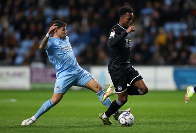 021121 - Coventry City v Swansea City - SkyBet Championship - Ethan Laird of Swansea City is tackled by Gustavo Hamer of Coventry City